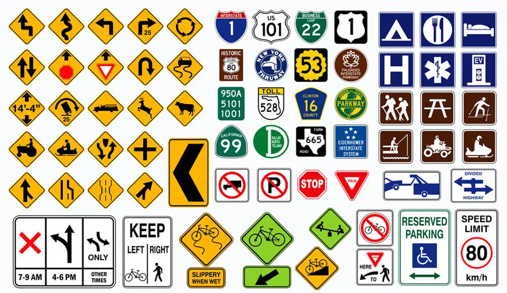 Una collezione di vari segnali stradali americani, dai numeri delle strade ai cartelli di pericolo