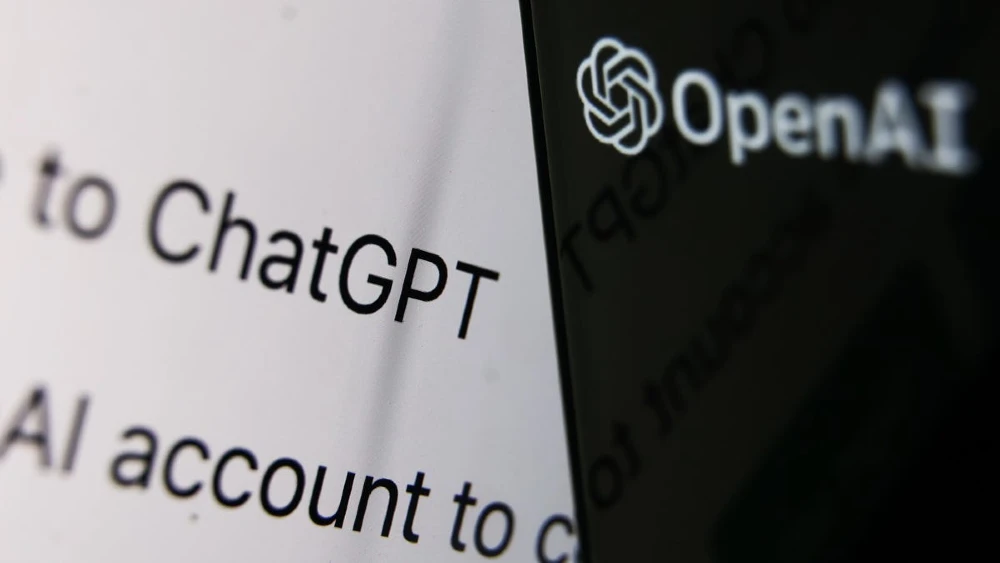 Un disegno con le scritte "To ChatGPT" ed "OpenAI" leggermente sfuocato sulla destra