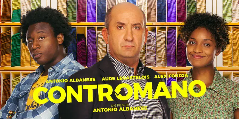 I tre protagonisti del film all'interno del negozio di calzini mentre guardano verso la macchina fotografica